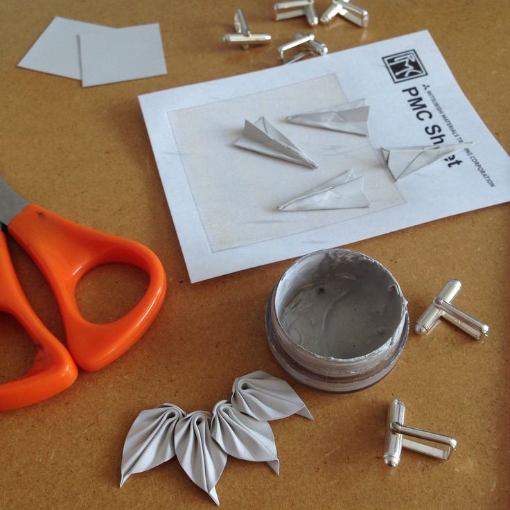 Folding Precious Metal Clay charms and securing with slip clay